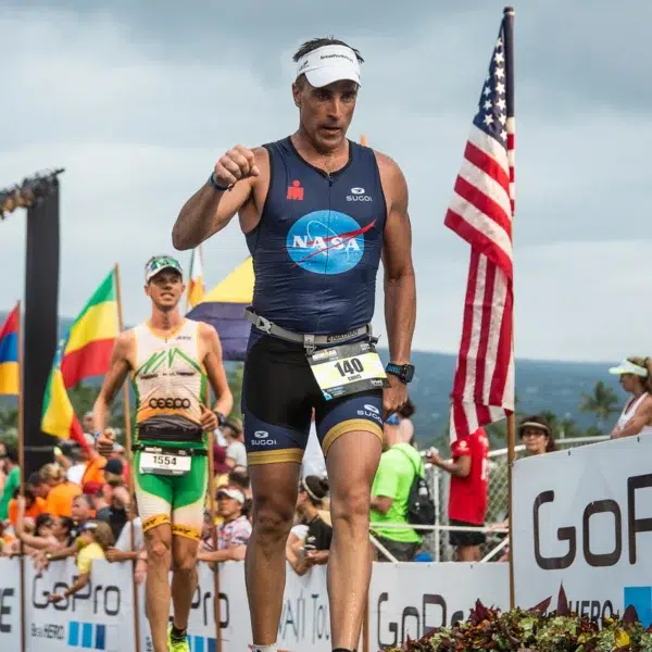 Chris Cassidy Competing at the Ironman World Championship NASA Astronaut and Navy SEAL Chris Cassidy competing at the Ironman World Championship in Kona, Hawaii, wearing a NASA-branded triathlon suit.